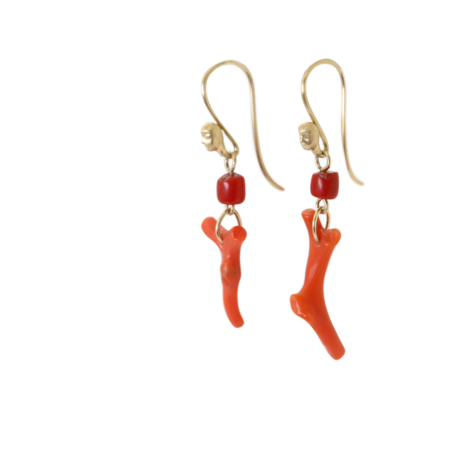 Red coral gold figurehead earrings by Hannah Blount