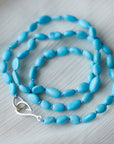 Kingman turquoise necklace with lavender-hued silk and silver clasp by Hannah Blount