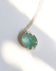 Emerald necklace with barnacle details in the sun
