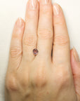1.635ct Pink Montana Sapphire on hand for scale