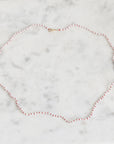 Pearl necklace on a marble surface