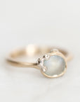 Rough Montana Sapphire set in yellow gold bezel ring with white gold barnacle accents