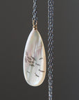 Codfish and school of fish scrimshaw on mother of pearl - necklace
