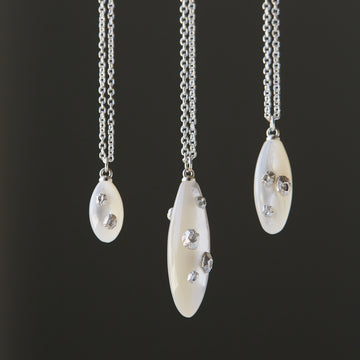 Mother of pearl necklace with silver barnacles by Hannah Blount