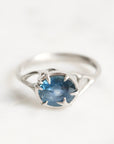 Platinum branchy ring with deep blue stone