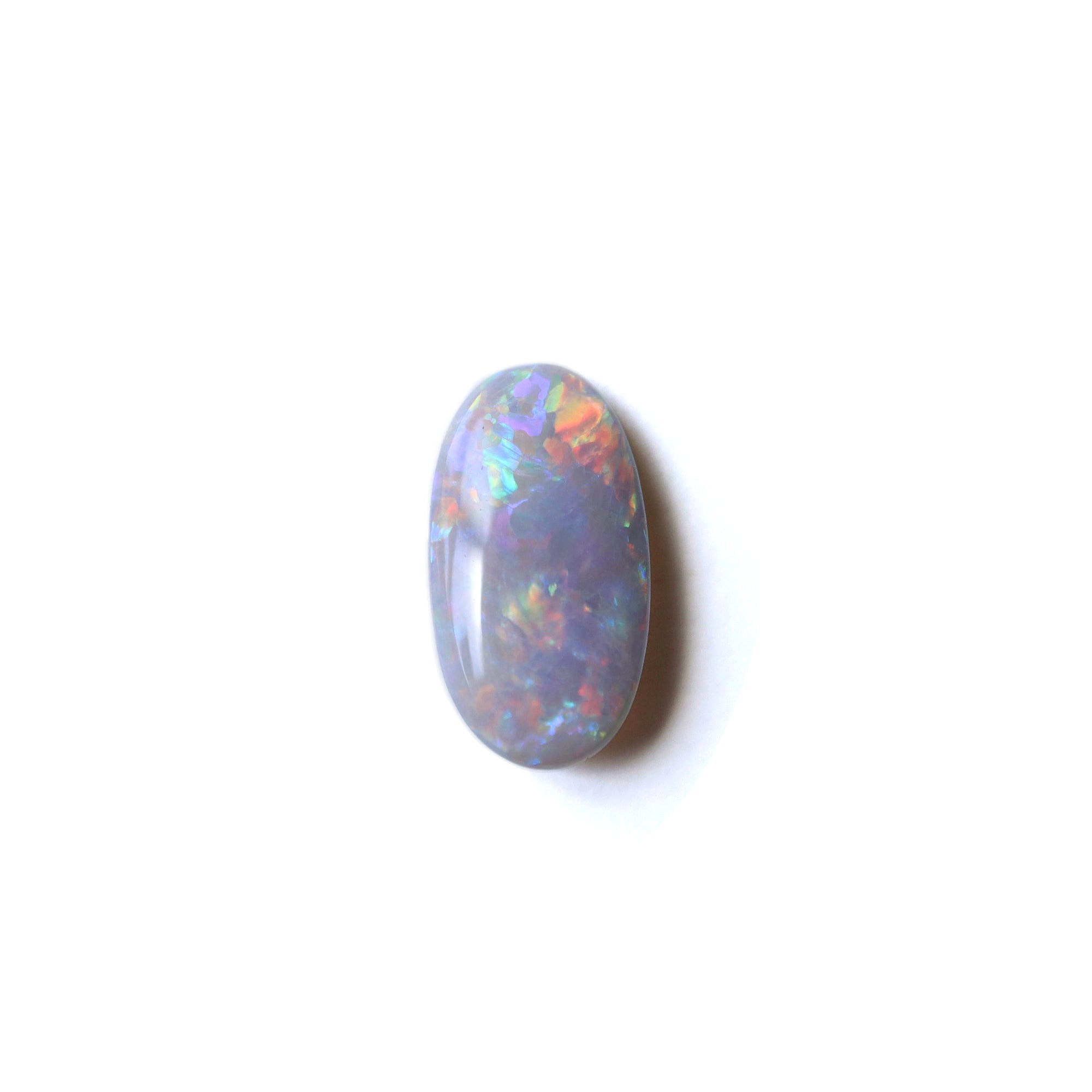 1.55ct Lightning Ridge Australian Opal on white background. 