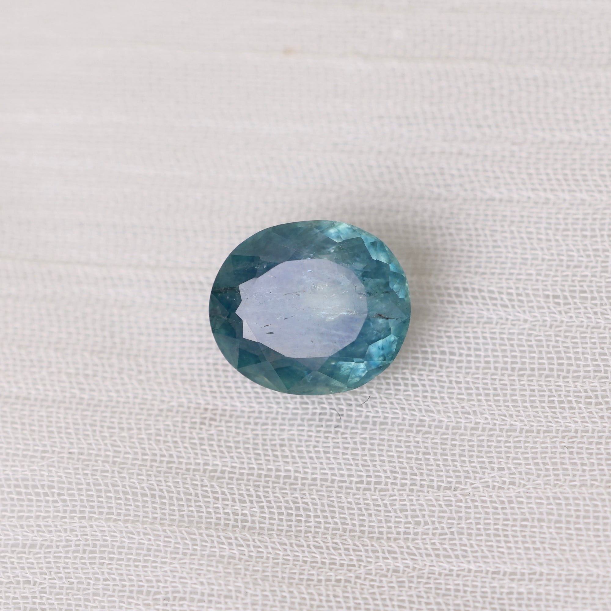 Blue stone on white background 