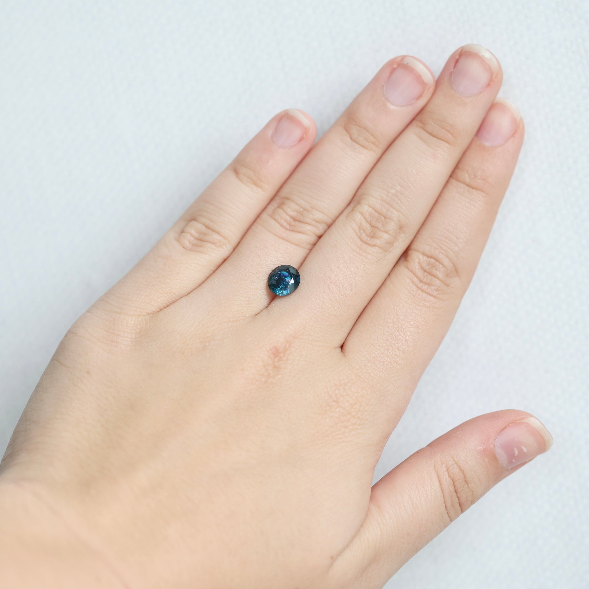 Blue sapphire on hand 