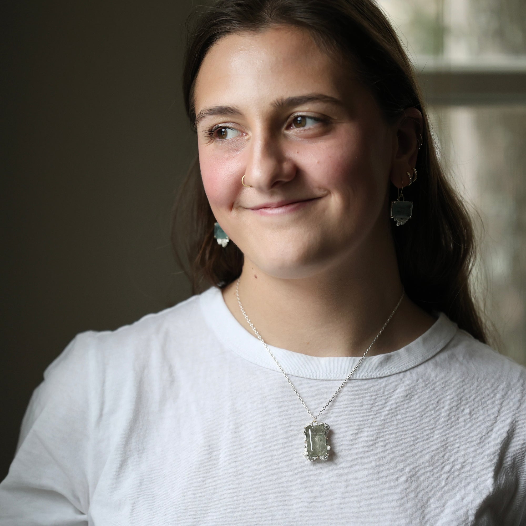 woman wearing necklace