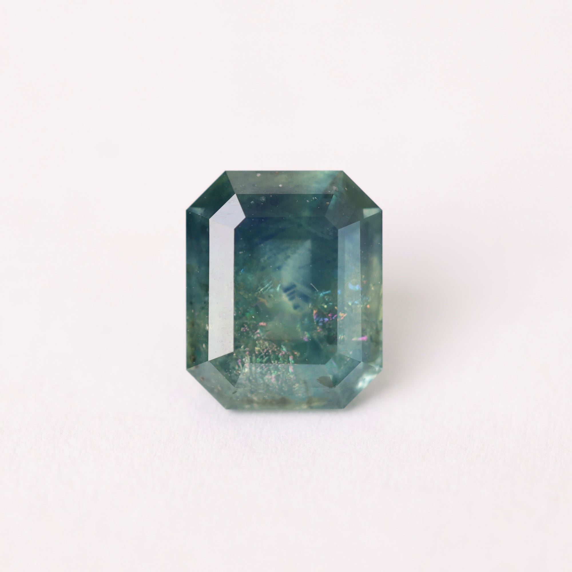 Faceted gemstone on a white background