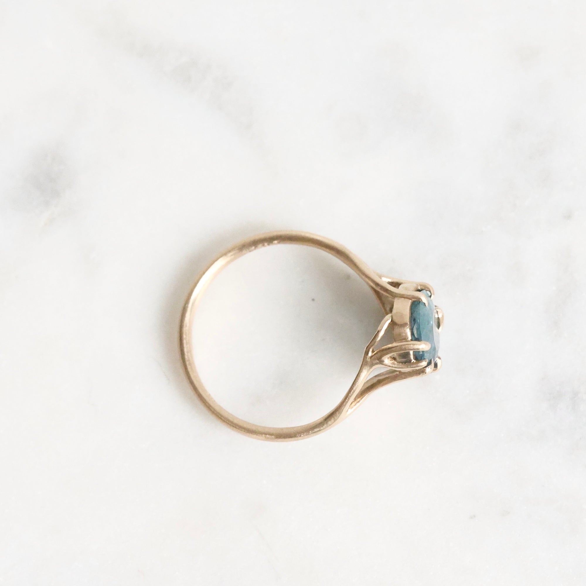 Gold branch ring with blue gemstone