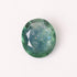 Green gemstone on a white background