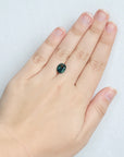Green sapphire on hand 