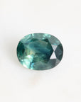 Green montana sapphire with inclusions