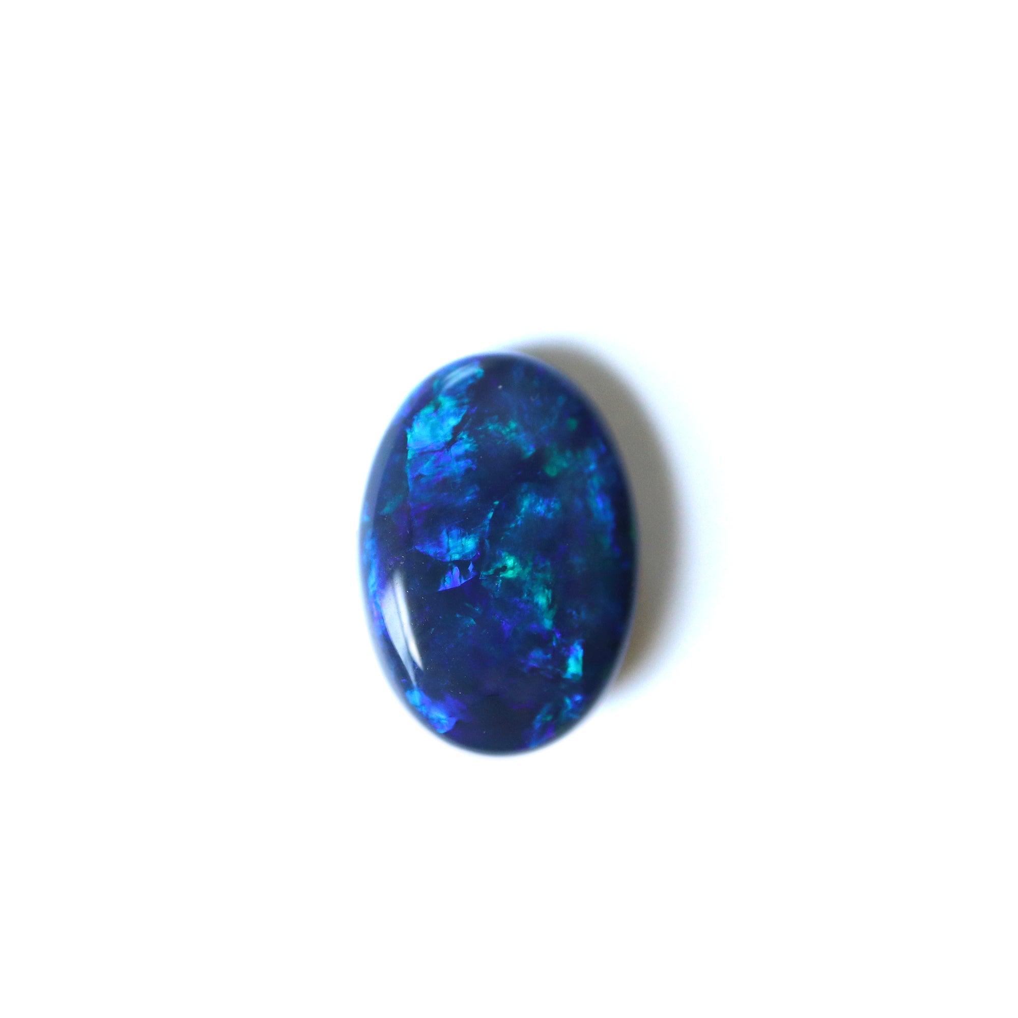4.65ct Lightning Ridge Black Australian Opal on white background.
