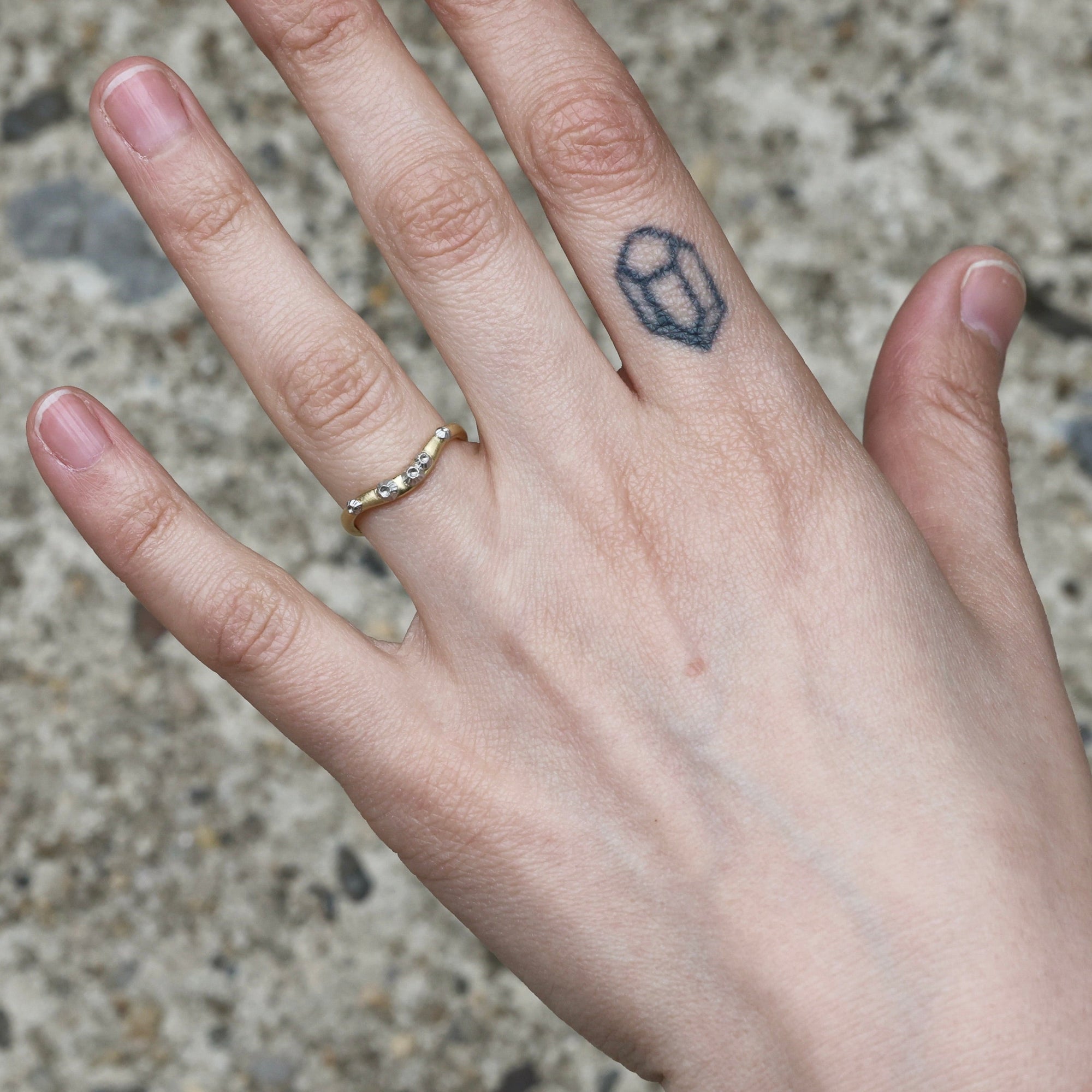curved barnacle band alone on hand