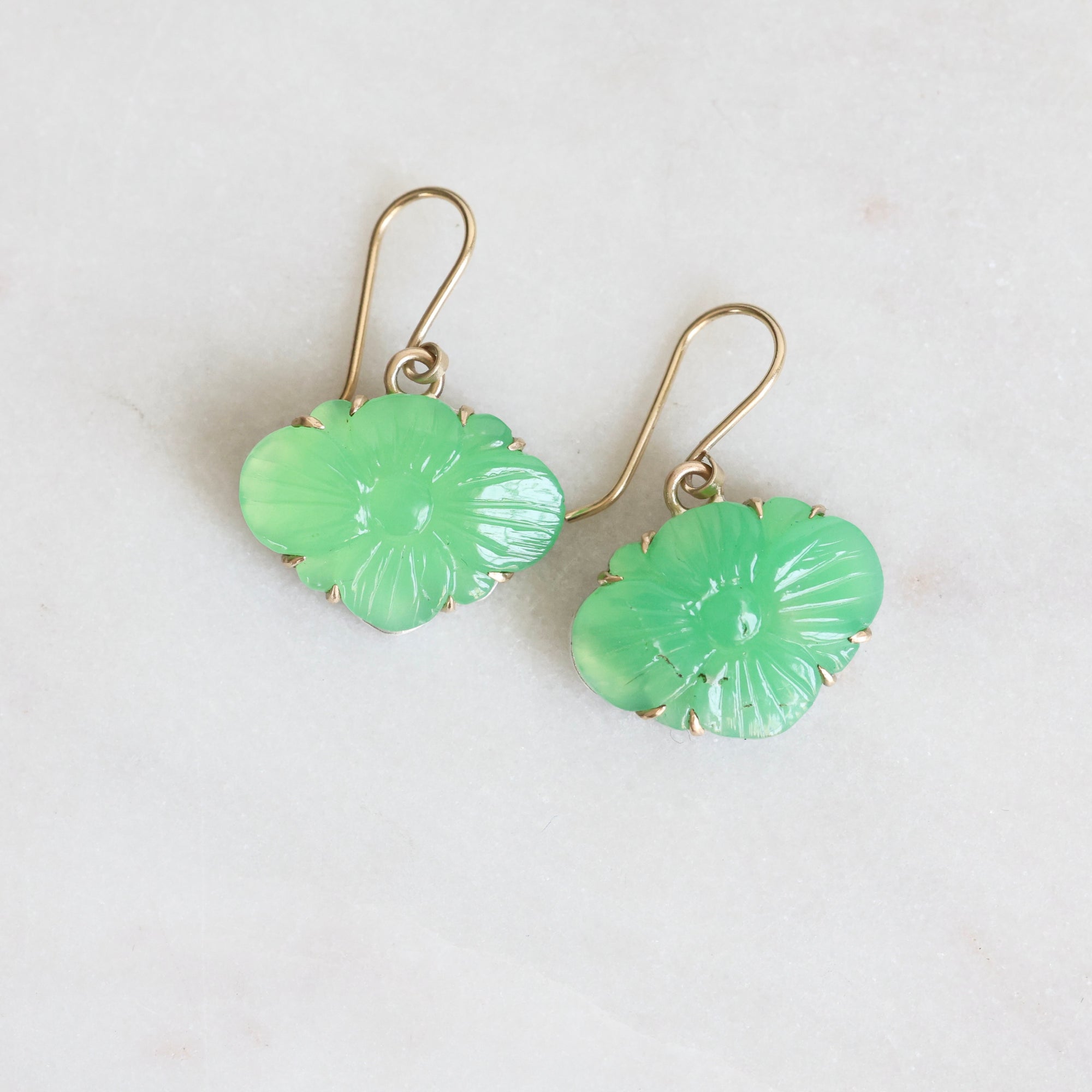 Pair of green carved earrings