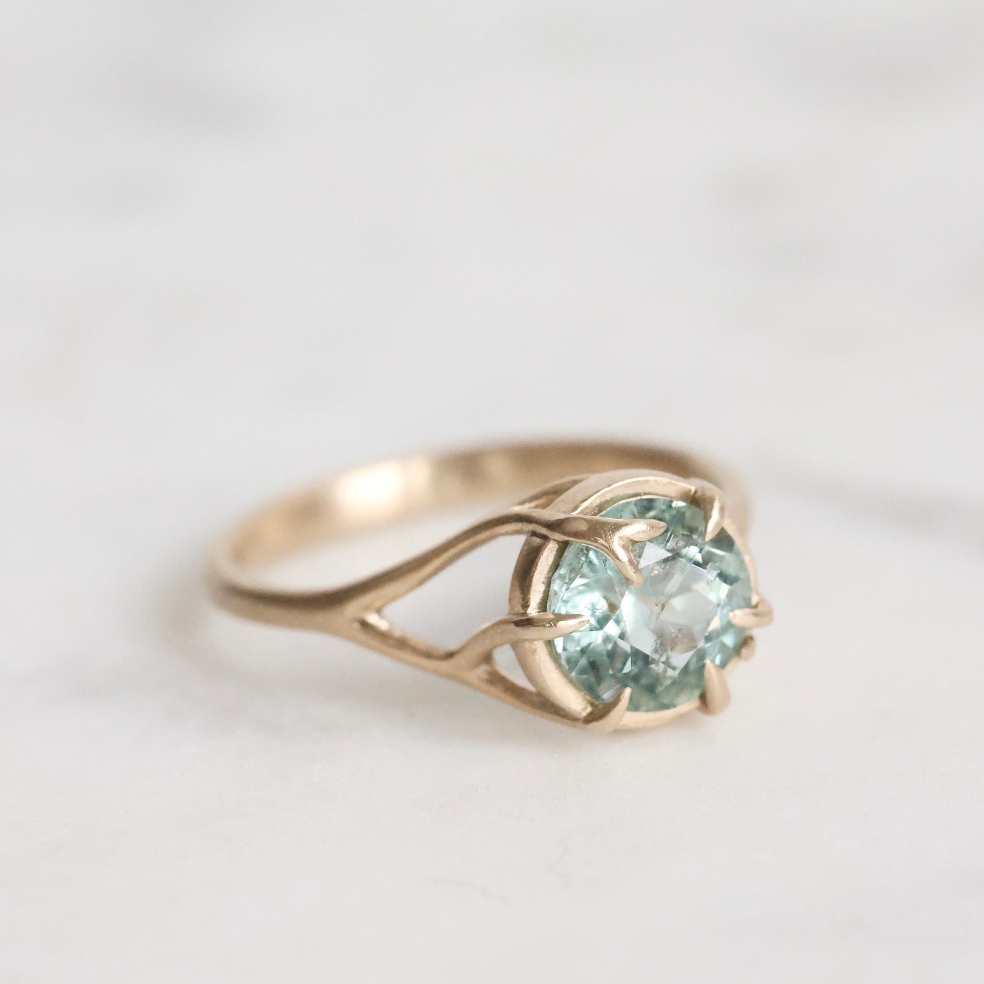 Gold branch ring with blue stone 