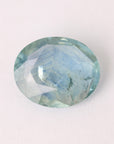 Faceted gemstone on a white