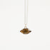 Necklace with a pendant on a white background