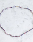 Pearl necklace on a marble surface