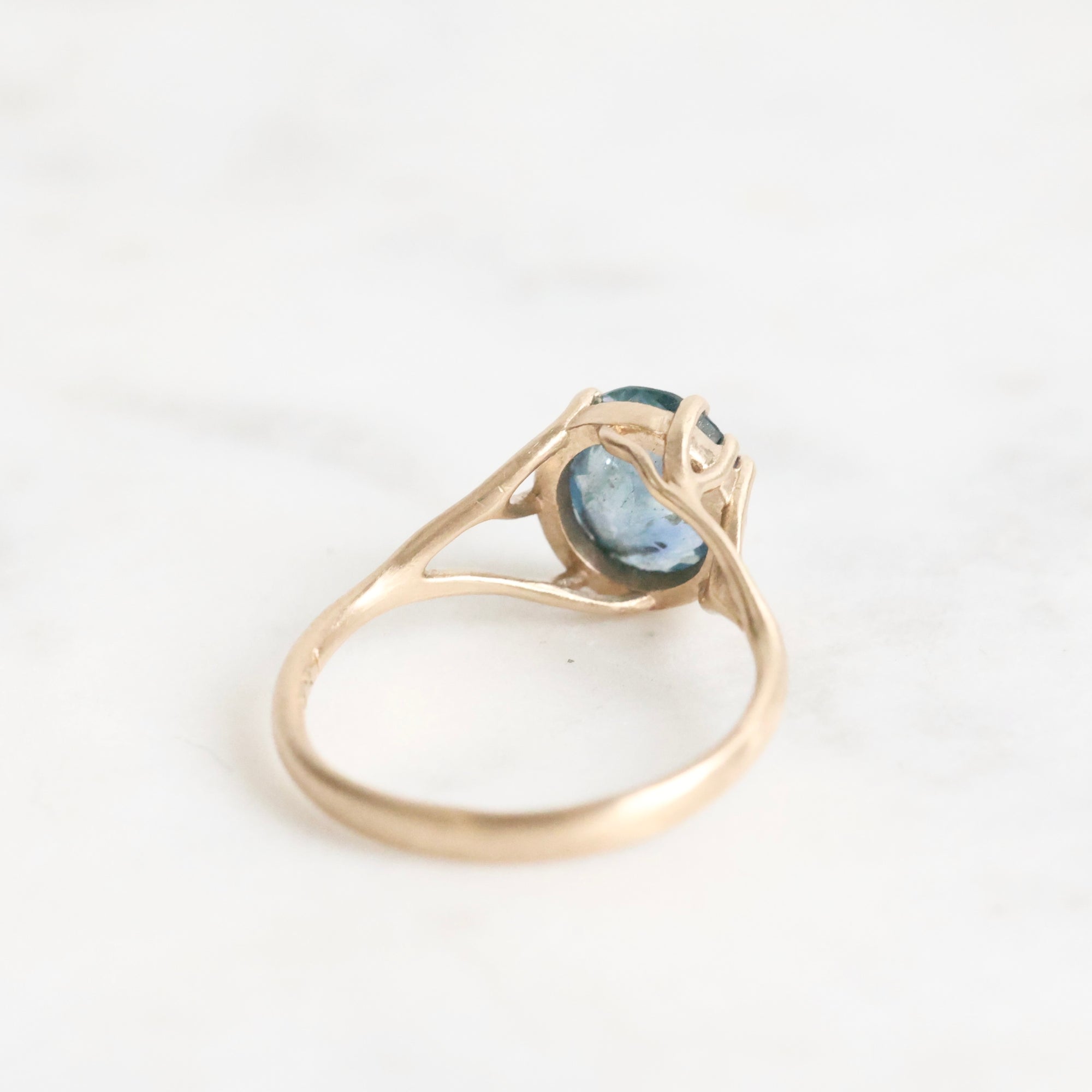 Gold branch ring with blue gemstone