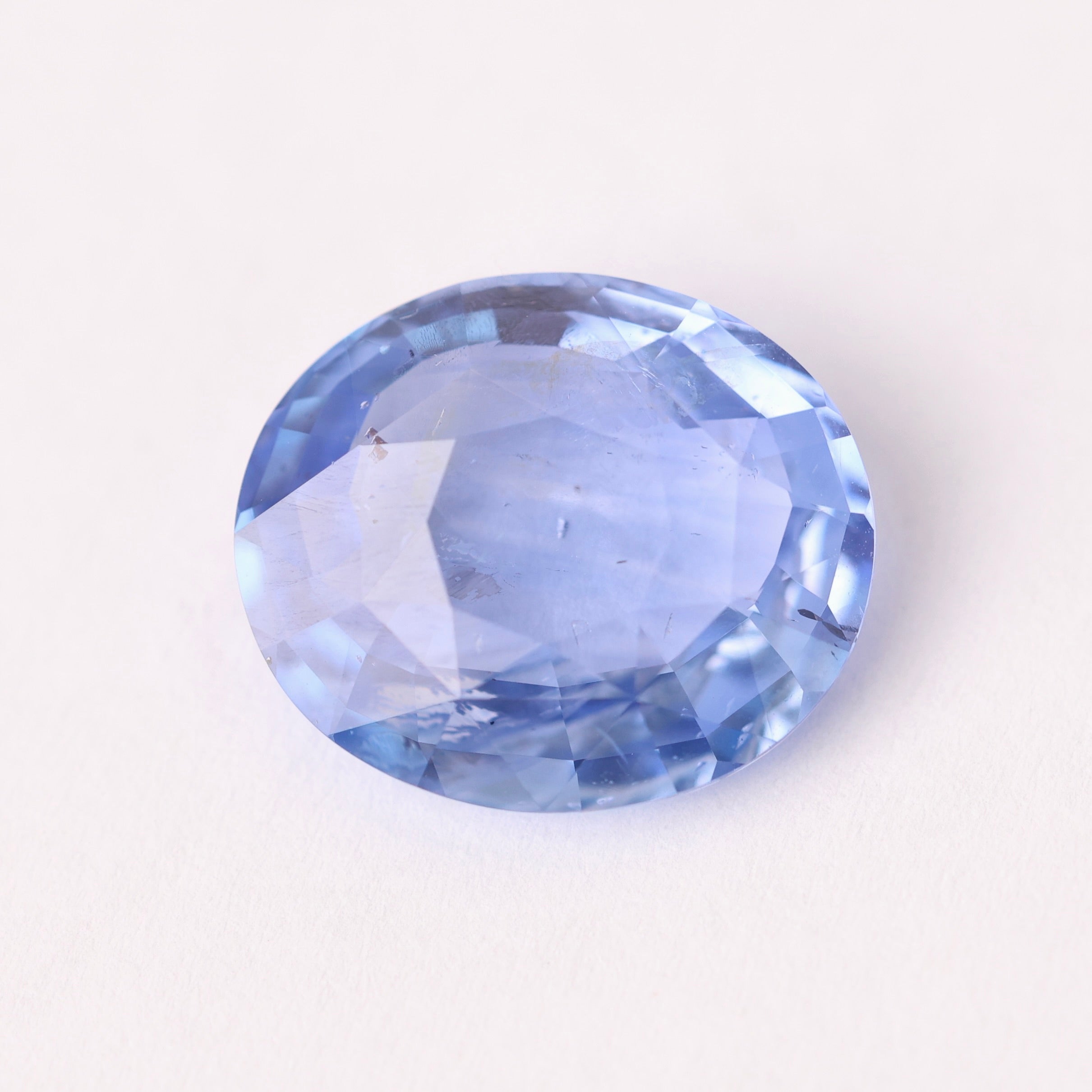 Blue gemstone on a white background