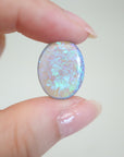 7.2ct Lightning Ridge Australian Opal in hand for scale.