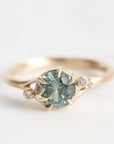 Gold branch rings with blue gemstone and diamonds