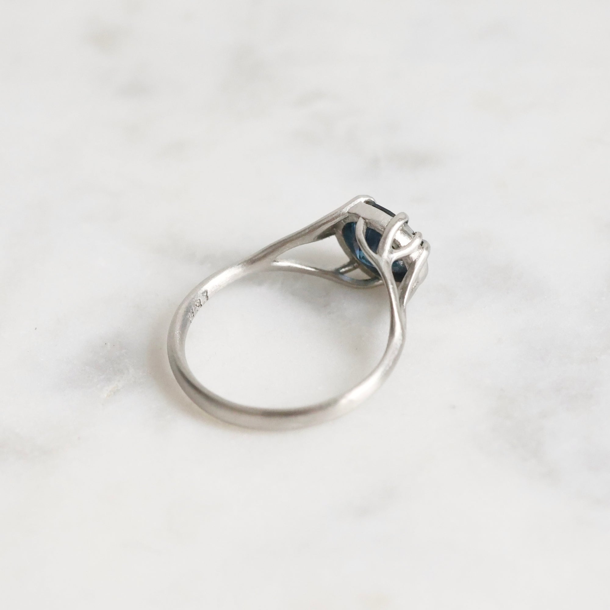 Platinum branchy ring with deep blue stone