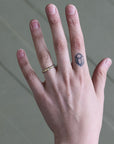 Hand wearing barnacle band 
