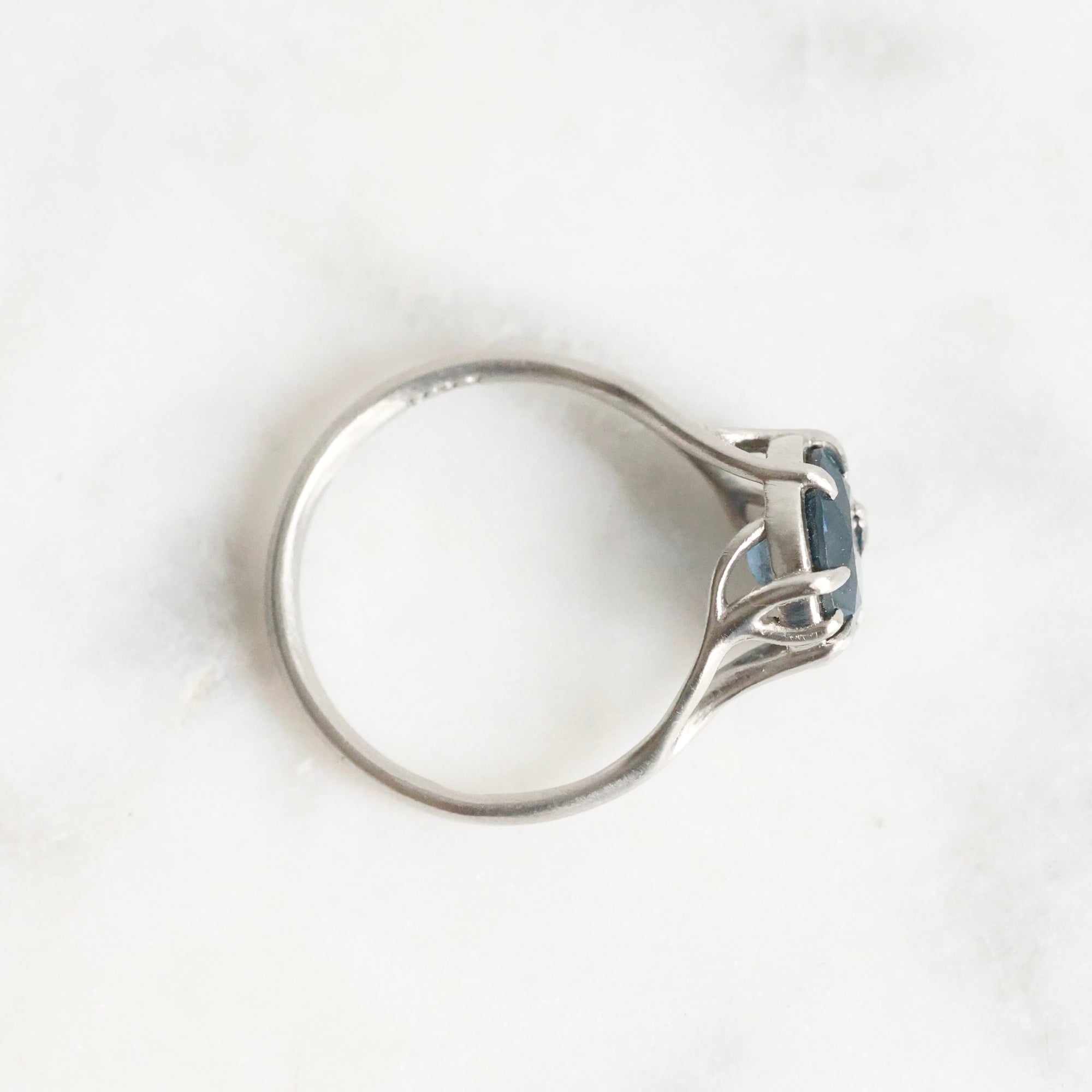 Platinum branchy ring with deep blue stone