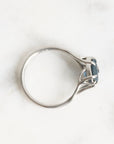 Platinum branchy ring with deep blue stone