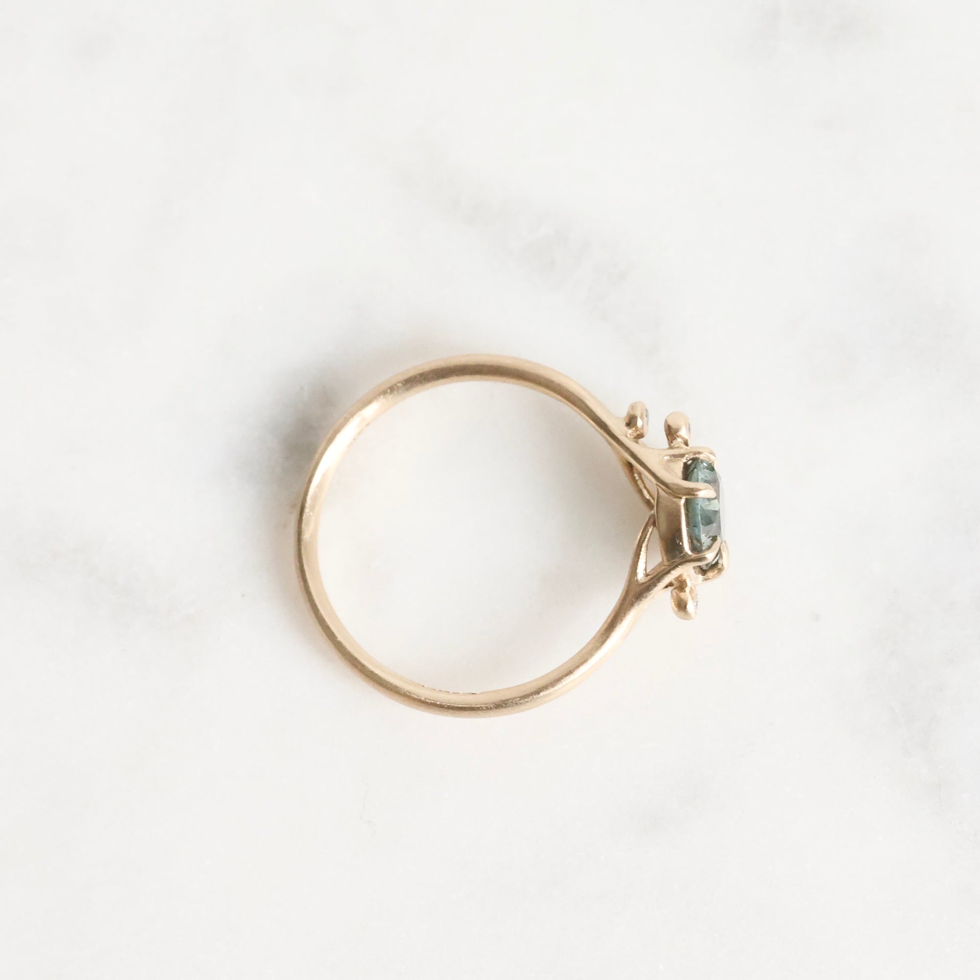 Gold branch rings with blue gemstone and diamonds