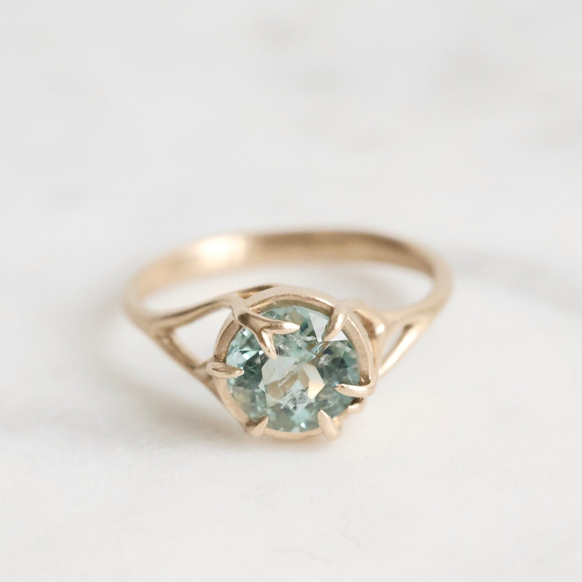 Gold branch ring with blue stone 