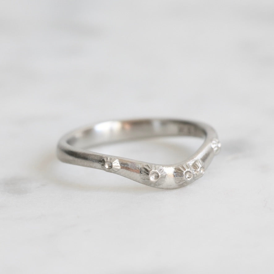 curved platinum barnacle bad with platinum barnacles