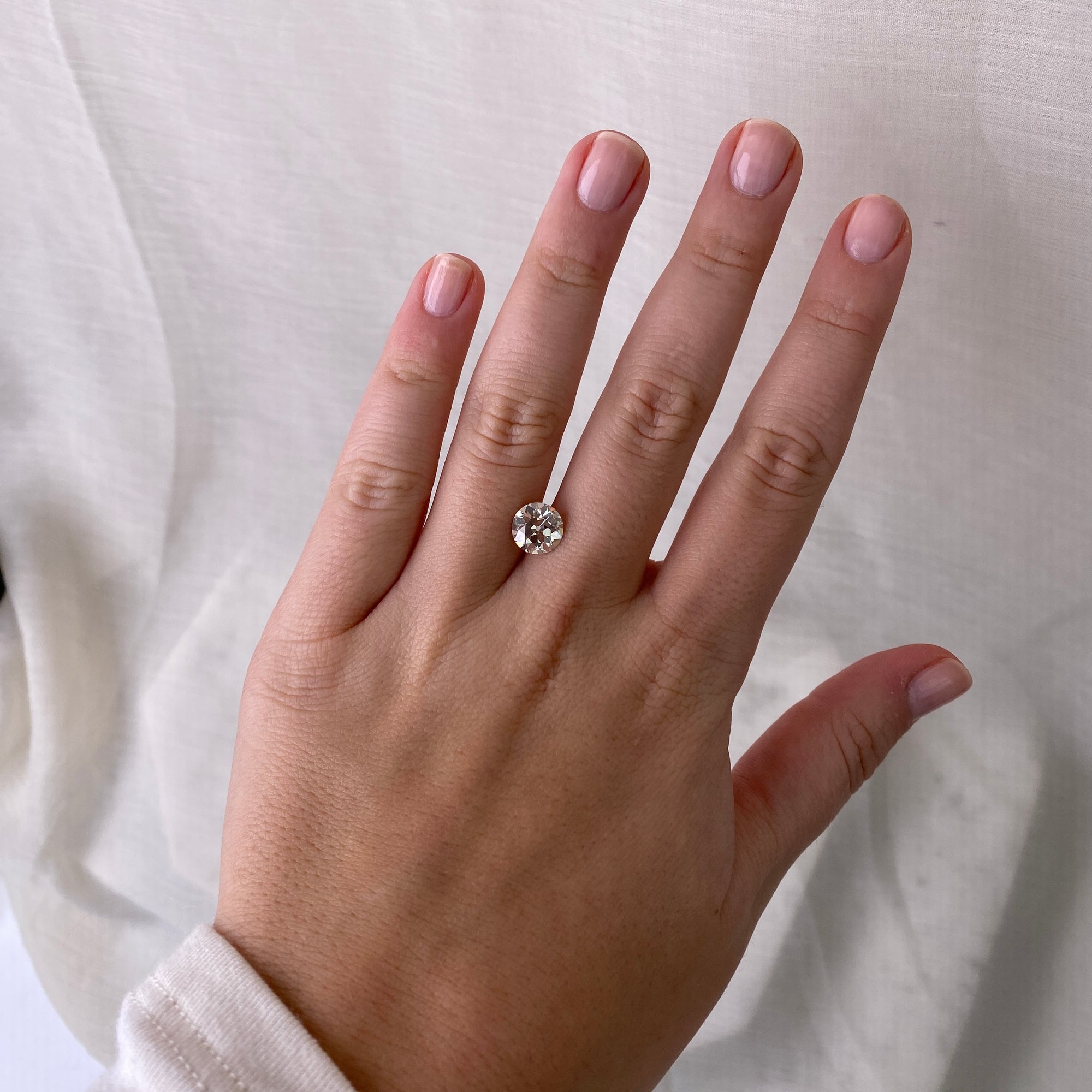 round diamond on hand 