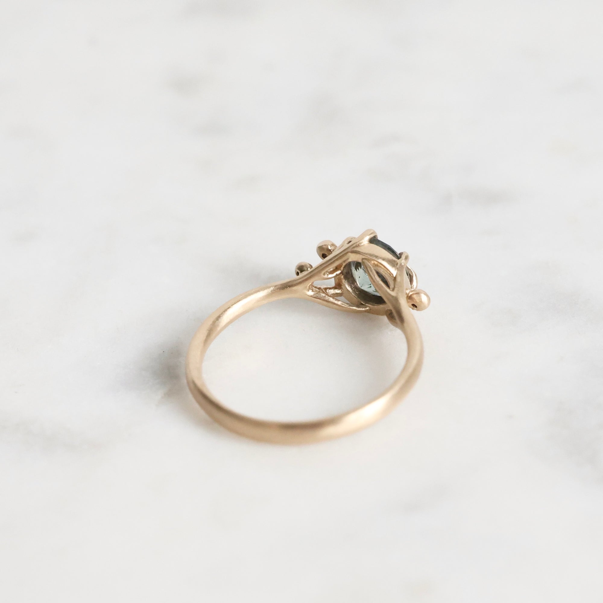 Gold branch rings with blue gemstone and diamonds