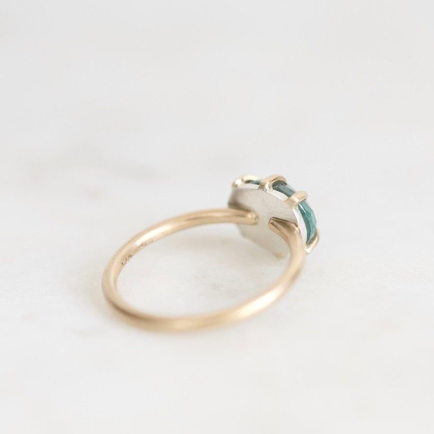 Green stone ring from behind
