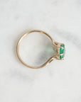 Green gemstone ring in gold branchy prongs