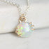 Opal pendant with gold prongs