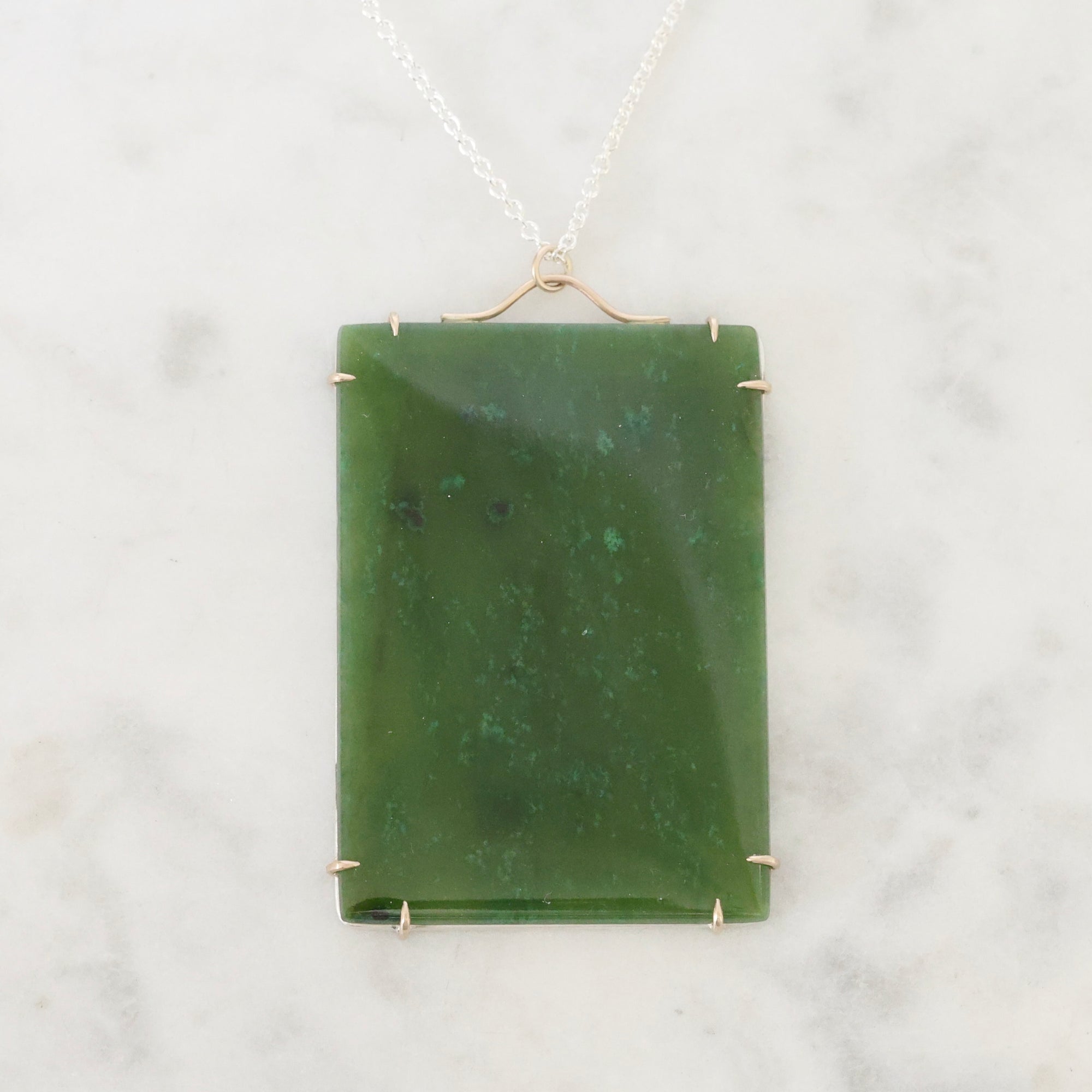 Large green rectangular stone pendant 
