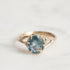 Gold branch ring with blue gemstone