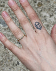 curved barnacle band on hand