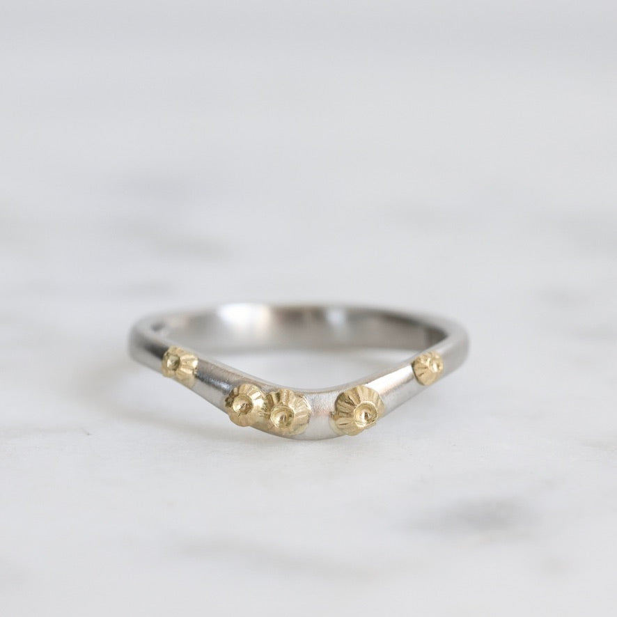 curved platinum barnacle bad with gold barnacles