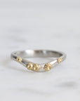 curved platinum barnacle bad with gold barnacles