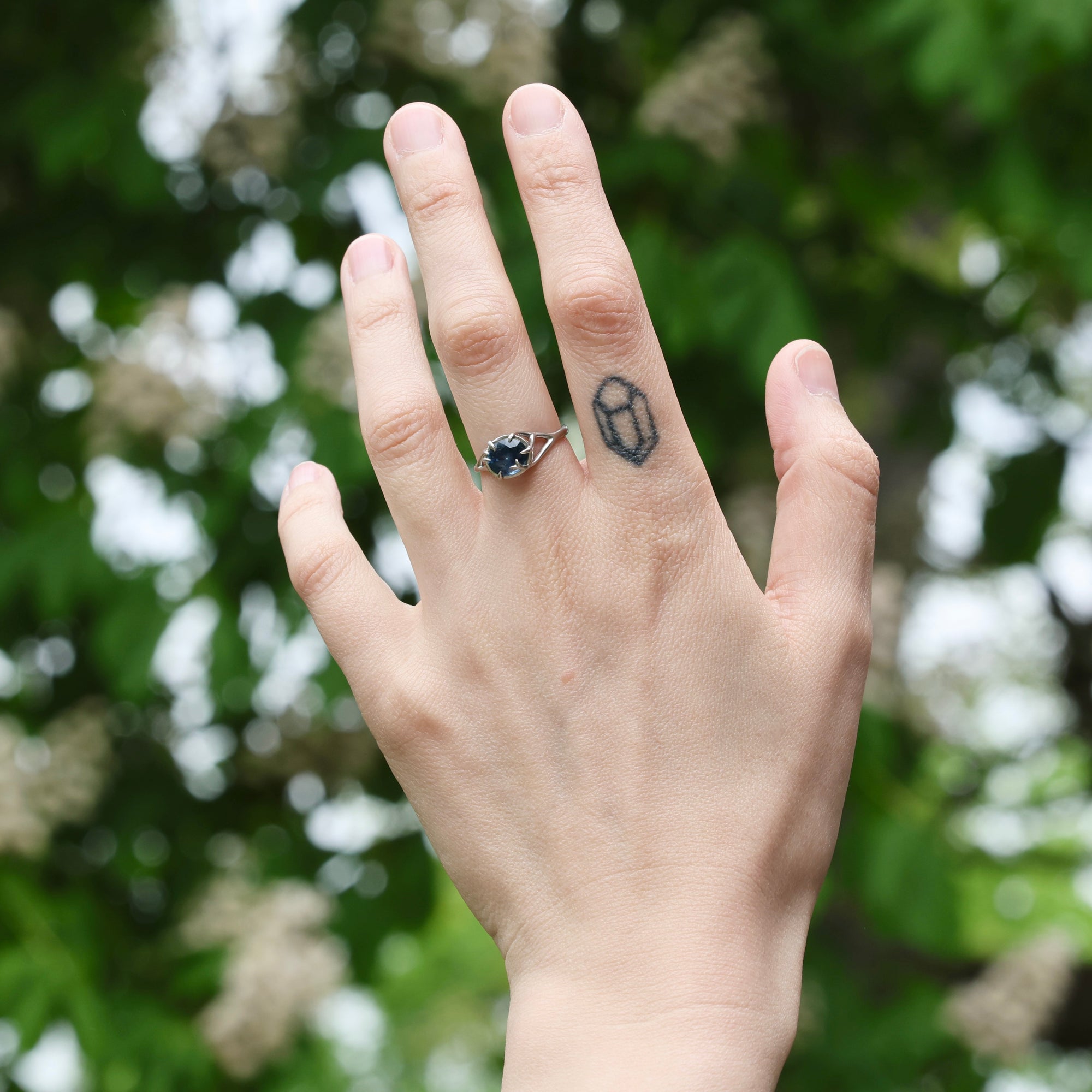platinum branchy ring on hand