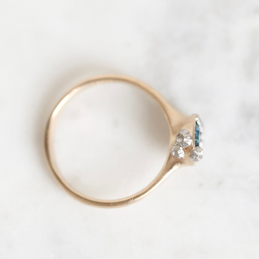 Gold bezel set ring with platinum barnacles. 