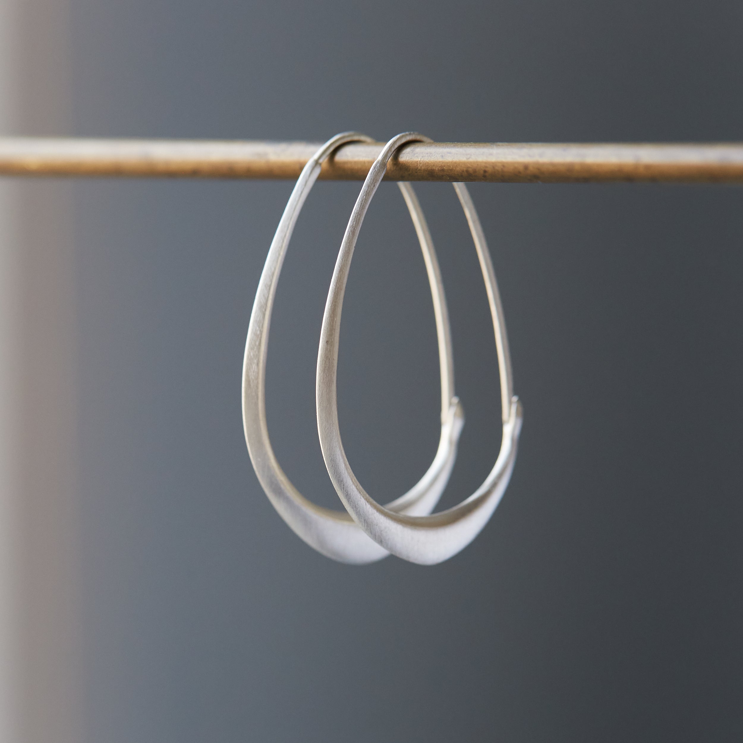 Silver facet hoops by Hannah Blount