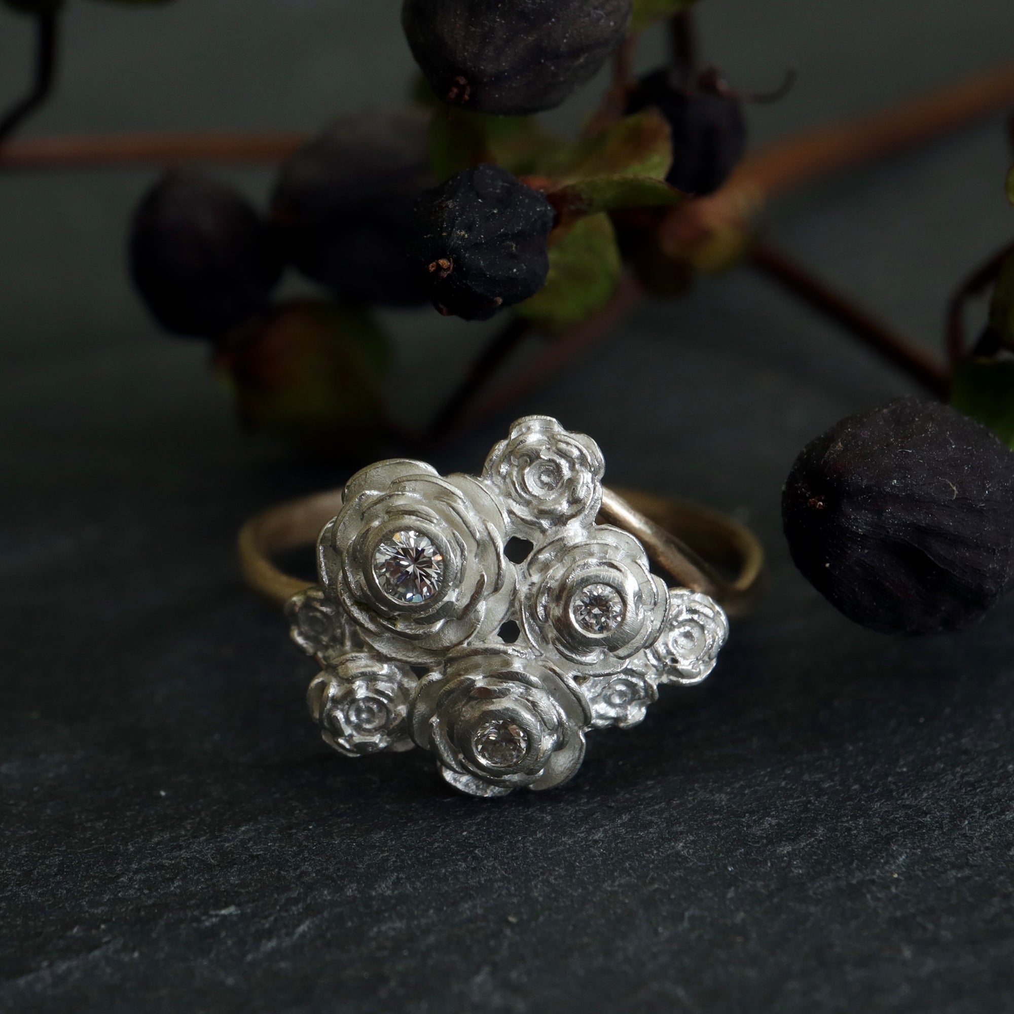 Handmade diamond rose ring in gold and silver by Hannah Blount